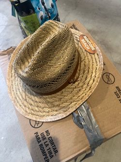 Big bundle of straw hats