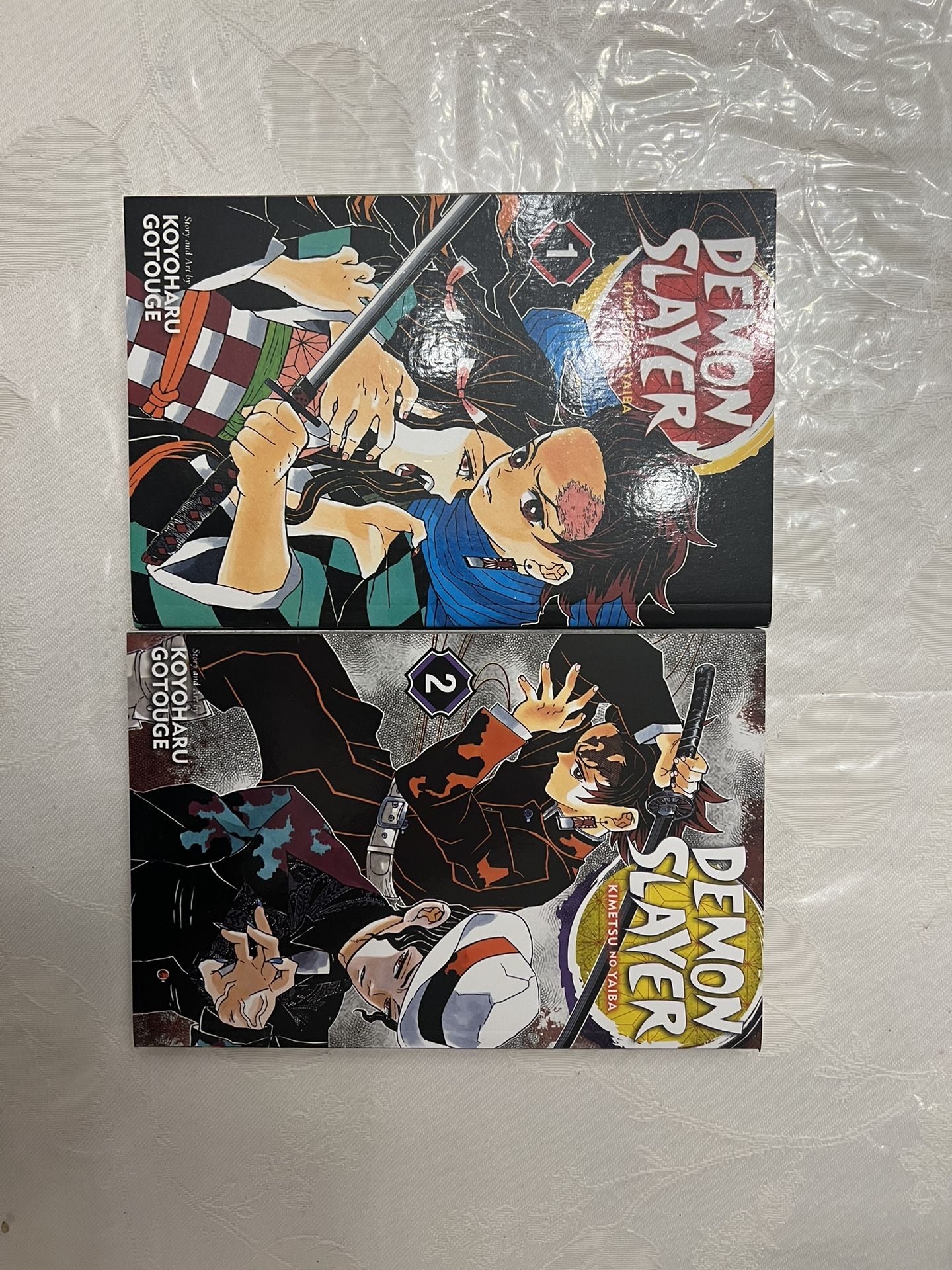 Demon Slayer manga volumes 1-2