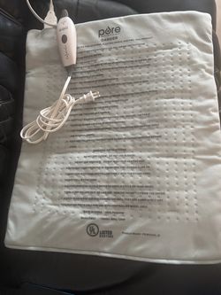 Gray electric heating pad by Pure Enrichment.