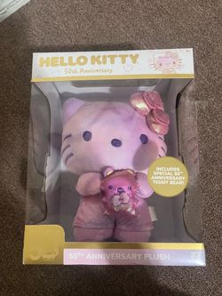 Hello Kitty plushie and backpack