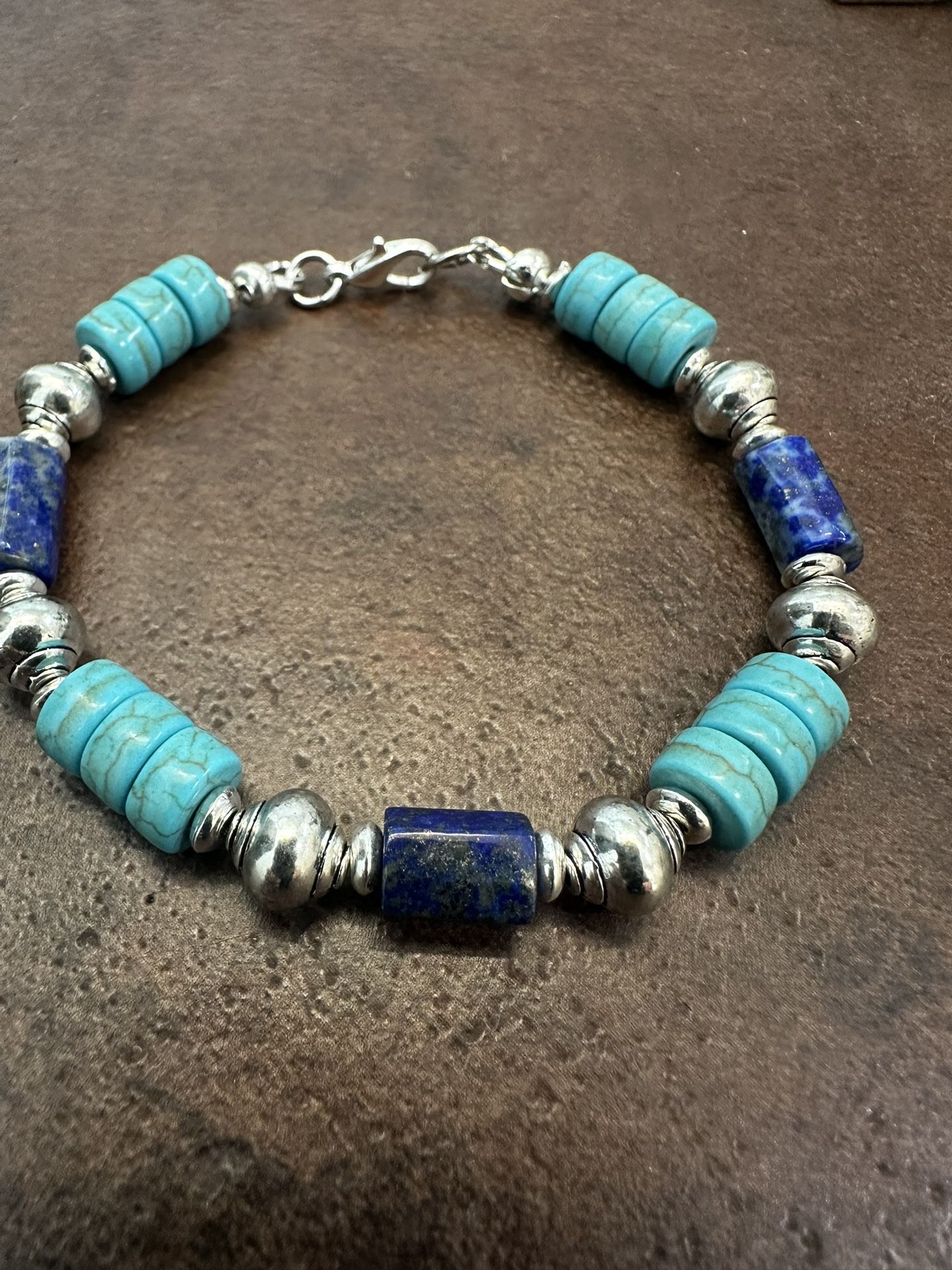 Blue Lapis Lazuli Bracelet with Silver Accents and Southwestern Design