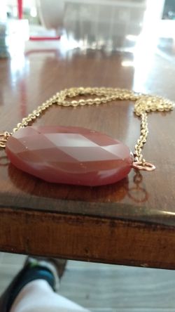 New, never worn. Carnelian necklace w lobster clasp. Gold tone chain