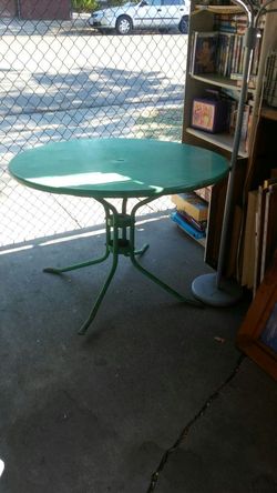Antique table with whole in middle