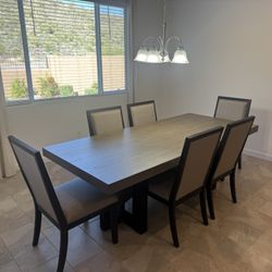 BRAND NEW Contemporary Dining Table and 6 Chairs.  $2450 Value