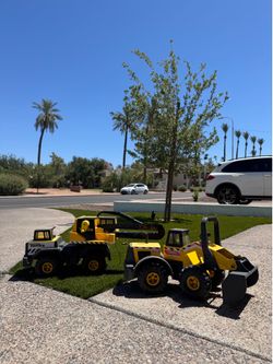 Large toy construction trucks