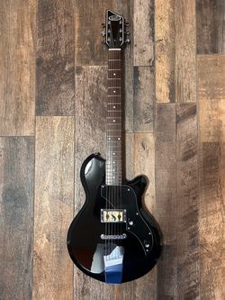 Supro Black Electric Guitar