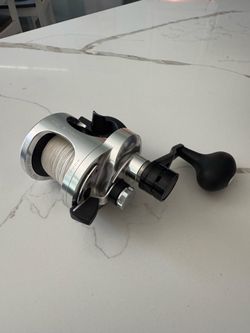 Like new Okuma Andros 12 2 speed fishing reel. With clean line.