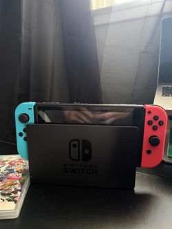Nintendo Switch with Neon Joy-Cons and Dock and games
