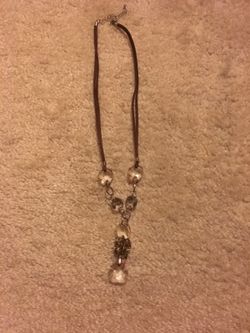 Necklace with leather