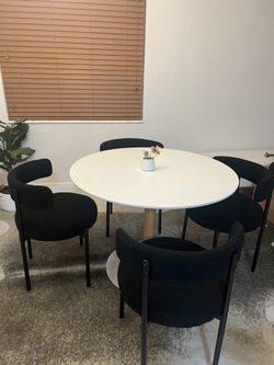 Modern white dining table & modern black dining chairs