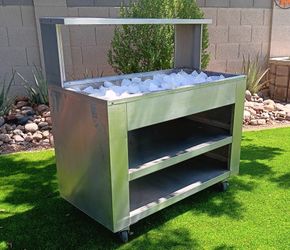 Stainles Steele rolling portable service bar cart.