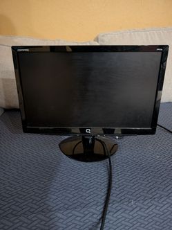 1 Acer and 1 Compaq desktop Monitors