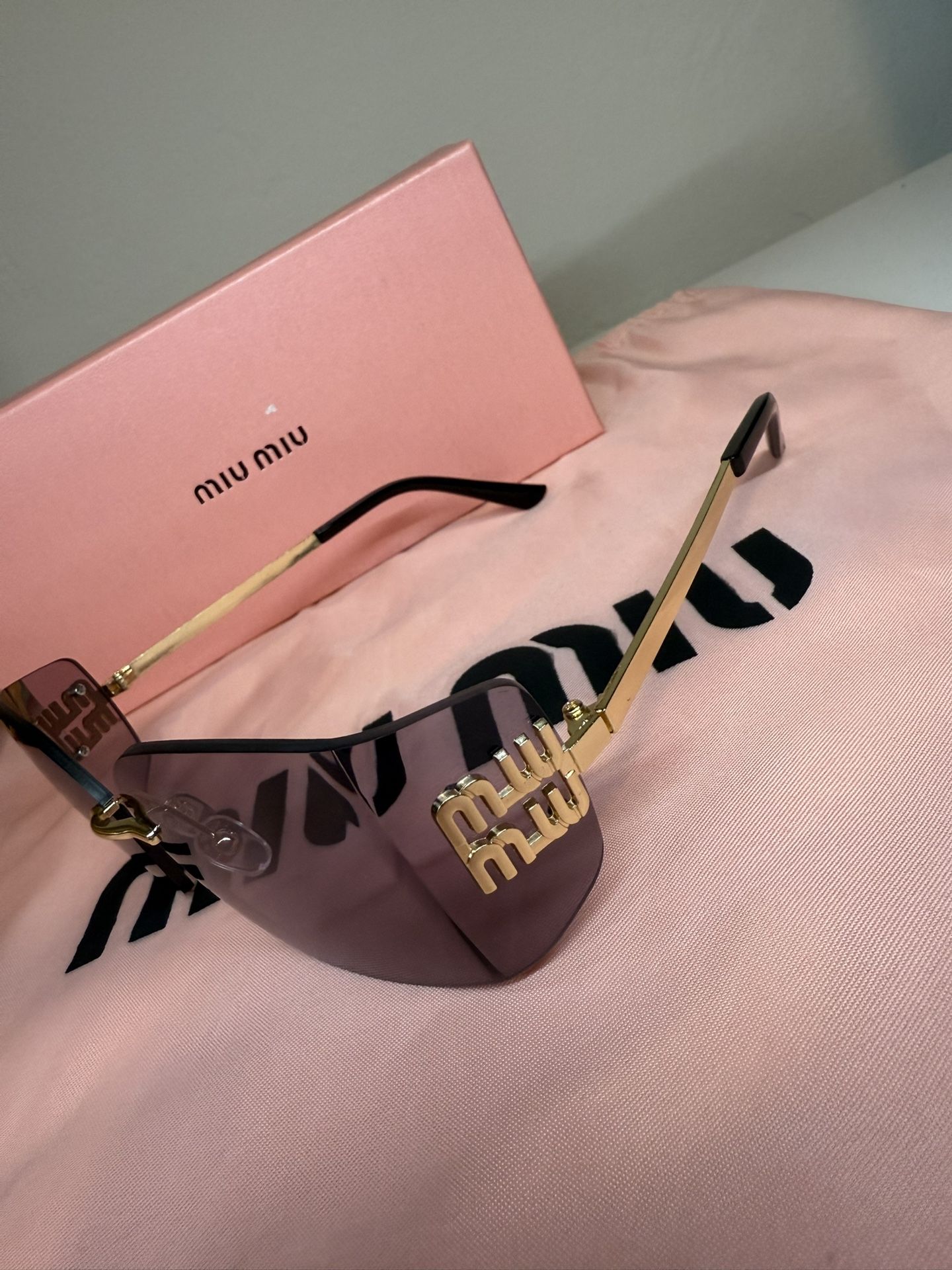 Miu Miuu Sunglasses