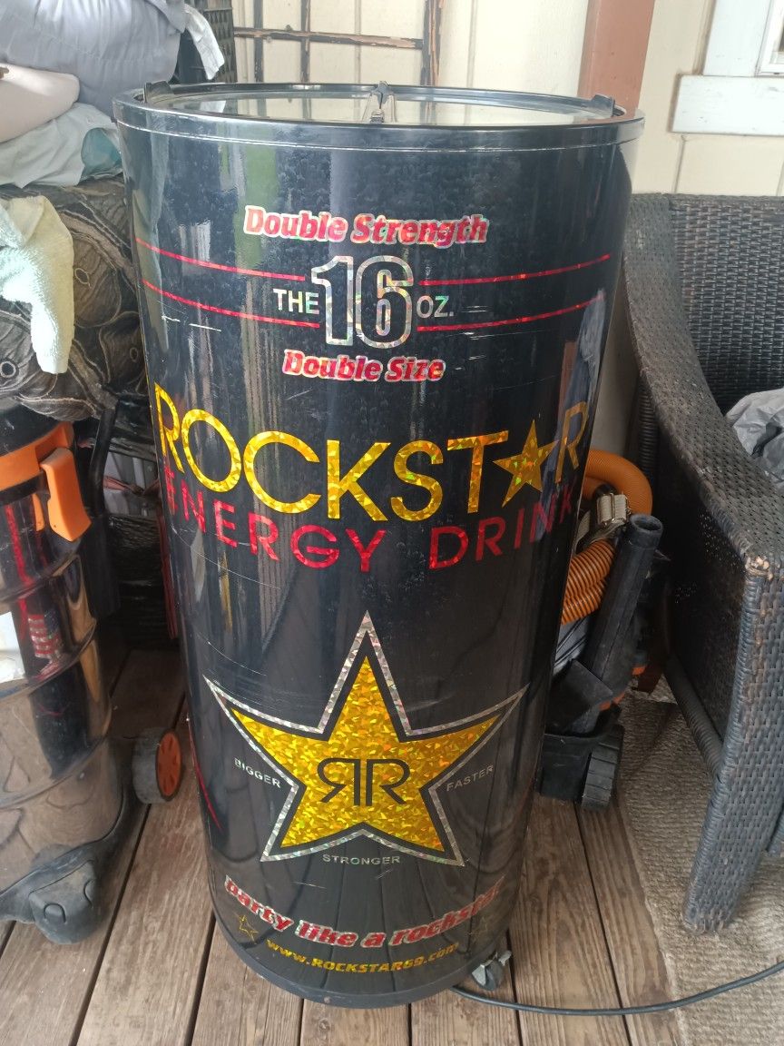 Rockstar Refrigerator With Top And Two Baskets On The Inside To Store Your Drinks Works Wonderful . Has The Lid That Opens Both Sides Great Condition