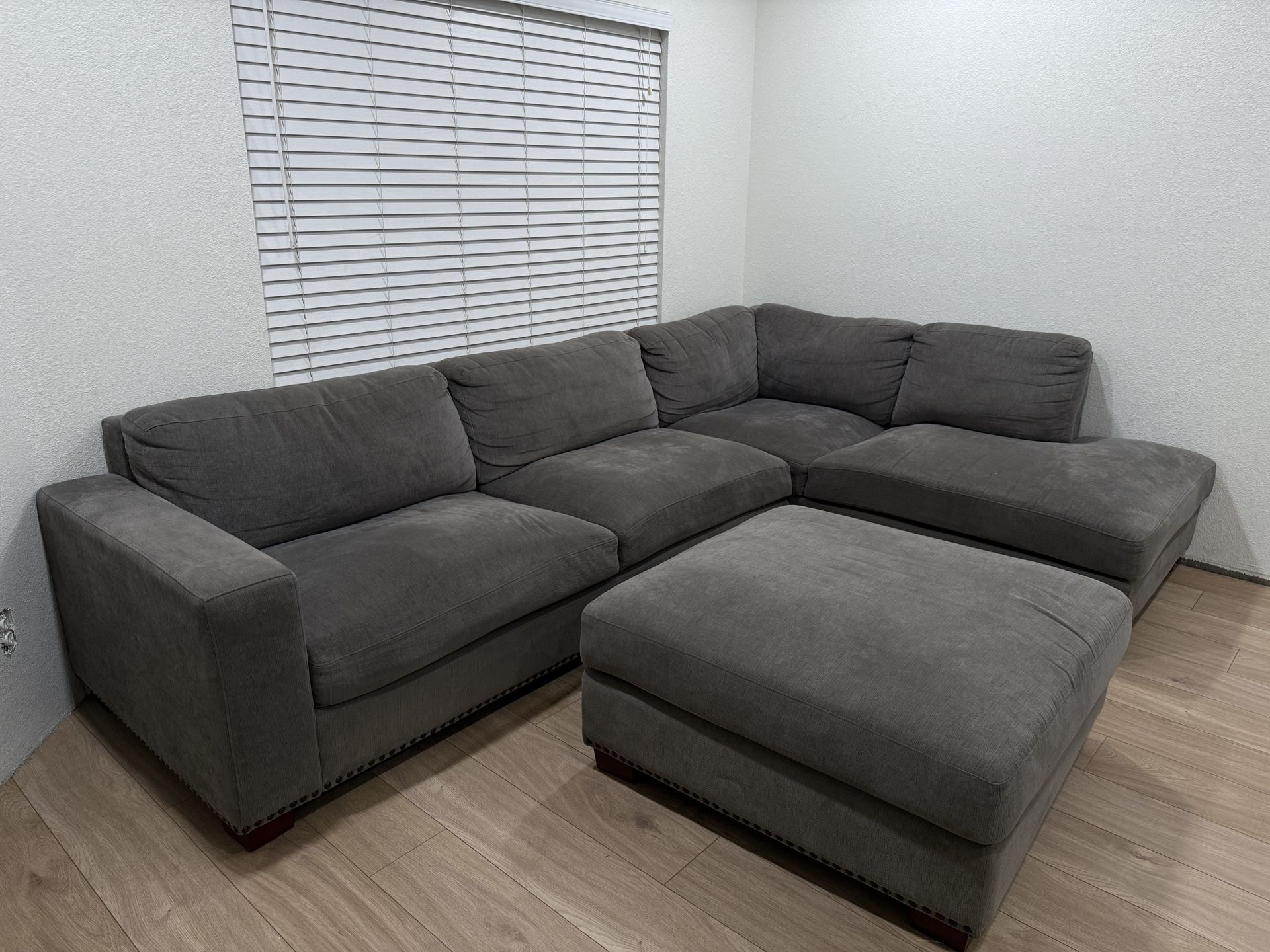 Large couch with chaise and ottoman