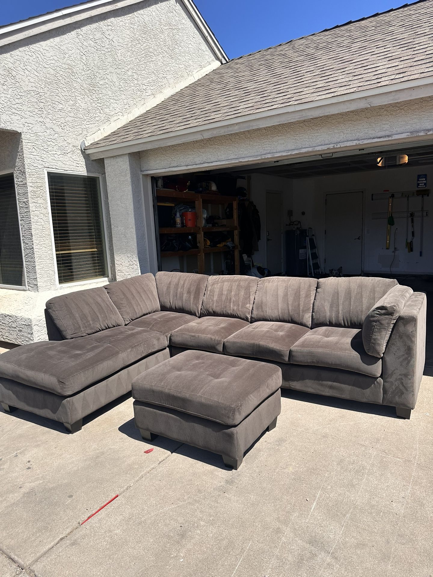 Grey Sueded Sectional Piece With Ottoman