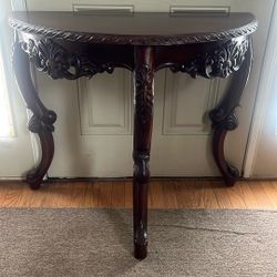 Beautiful ornate half round table