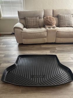 All-weather trunk mats for a 2016–2020 Honda Civic.