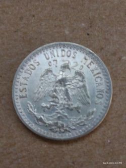 7 monedas de plata.  20 Centavos Mexicanos 
