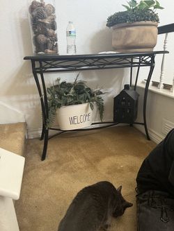 Rod iron table with glass top and brown wood surround $50 OBO50 OBO