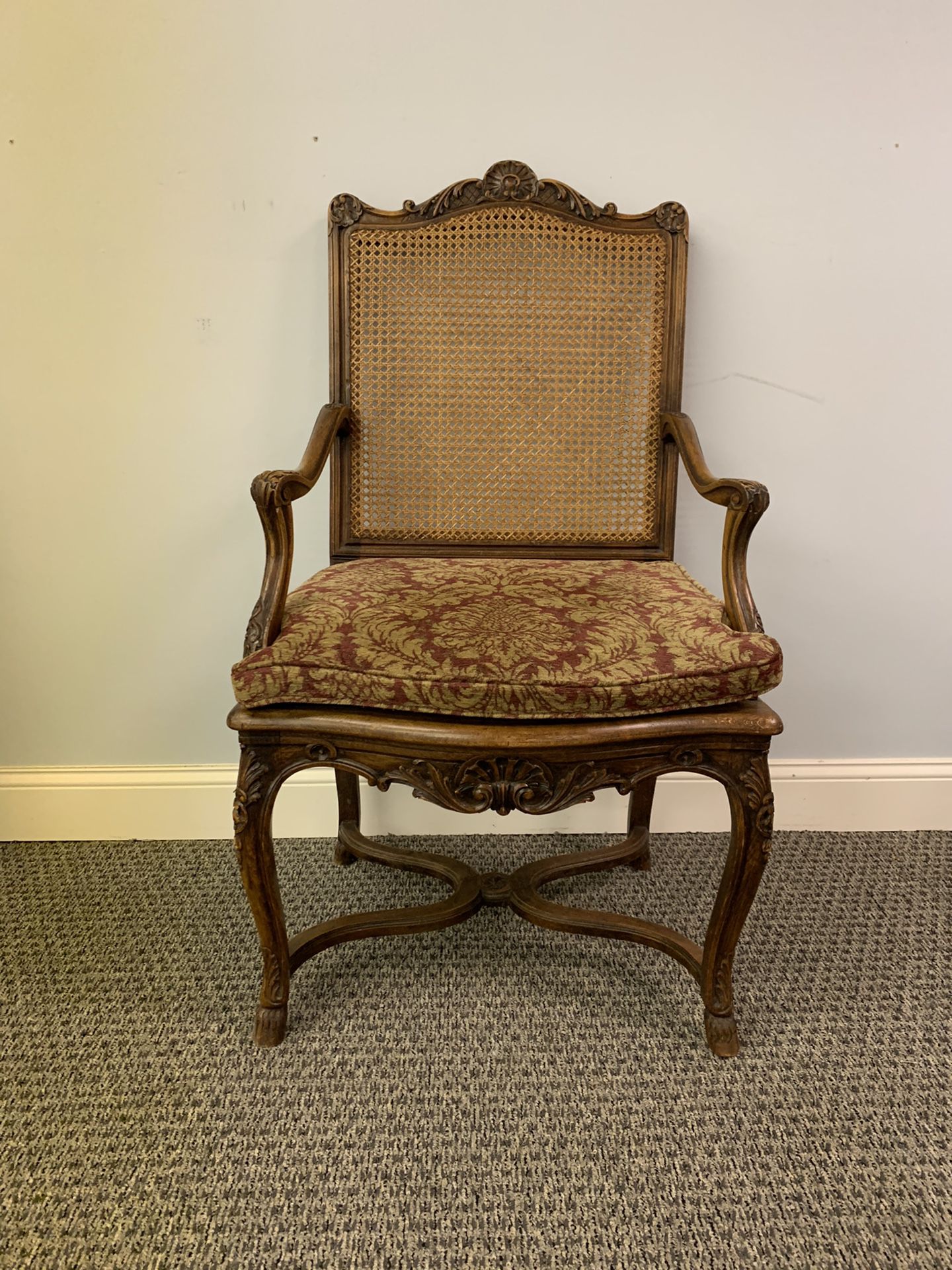 Antique wicker chair with custom cushion