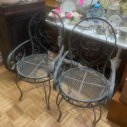 Vintage pair of ornate black wrought iron arm chairs chair garden patio