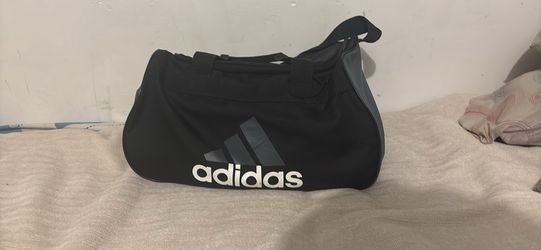 Adidas black and grey duffel bag