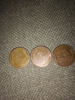 All Are  Wheat Penny's An All Have Writing On The Rim And One Is Made Of Different Metal I Think Than The Other One Other Ones