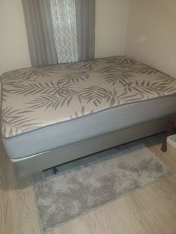Queen size bed box spring and frame ..niiice