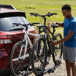 $200 (retail $360) Brand New in Box Bike carrier Wheeled Secured Hitch Mounted 2 bicycle rack.... brand New in Box never opened