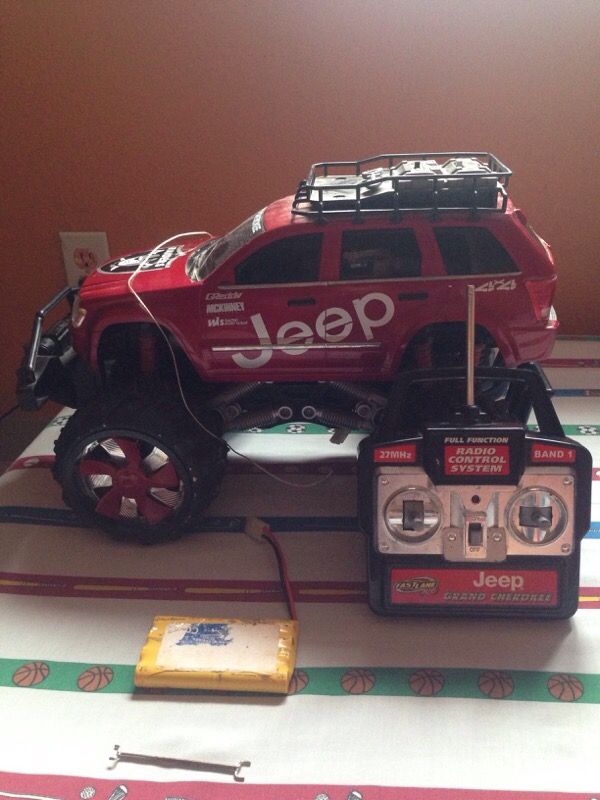 Fast lane R/C Grand Cherokee jeep radio control system on the top has