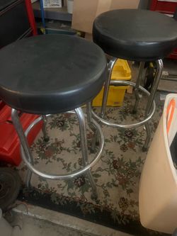 Two padded stools