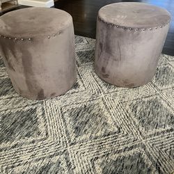 2 round grey ottomans