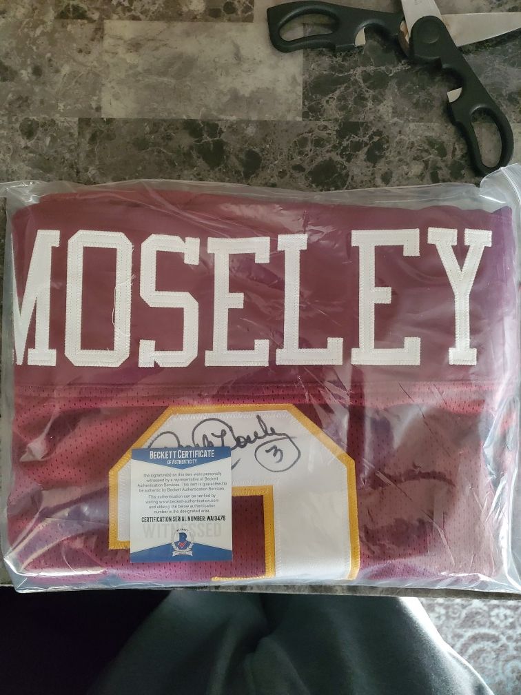 Autographed Skins jersey. Beckett COA