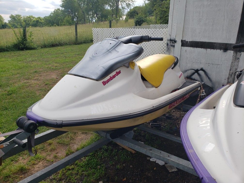 2 sea doo jetskis