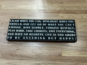 Decorative wooden hanging wall sign