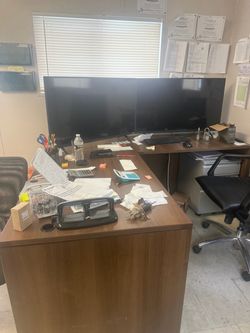 Corner desk and bookshelves