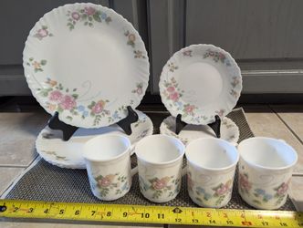 A Dinner Ware Set For 4.