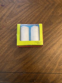 2 Porcelain salt and pepper shakers