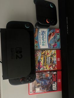 Nintendo switch with 3 games and extra controllers
