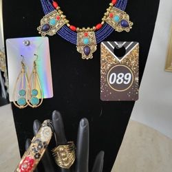 Blue beaded necklace with teal stones with gold