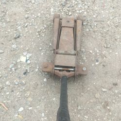 A Floor Jack It Works $60 As Is
