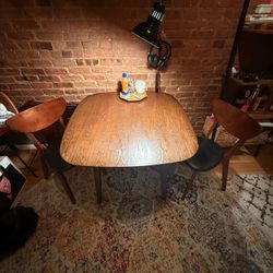 dining table with two matching chairs