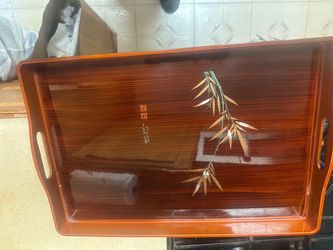 vintage Japanese rectangular lacquerware serving tray featuring a brushed wood grain finish and a decorative bamboo or floral-grass motif with gold an