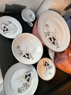 White Porcelain Dinnerware Set with Floral Pattern