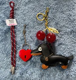 Cherry pup bag charm