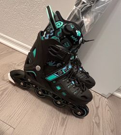 Hikole inline roller blades/ice skates.