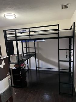 Full size loft bed w/ desk, shelves, and wooden steps