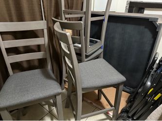 Ashley’s dining table 4 chairs brand new legs still in box