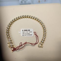 14k Solid Gold Tennis Bracelet Diamond Around It 18 Grams Layaway Available 10% Down If You Interested Please Ask For Maribel Thank You 
